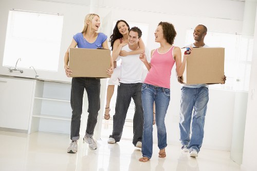 Removal team planning a house move in Streatham with boxes and furniture